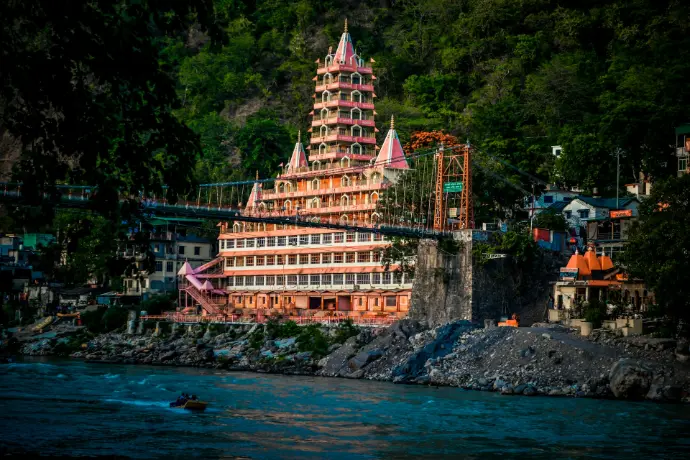A very tall building sitting on top of a river